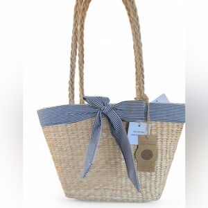 Elegant Tan Straw Tote with Navy Accents